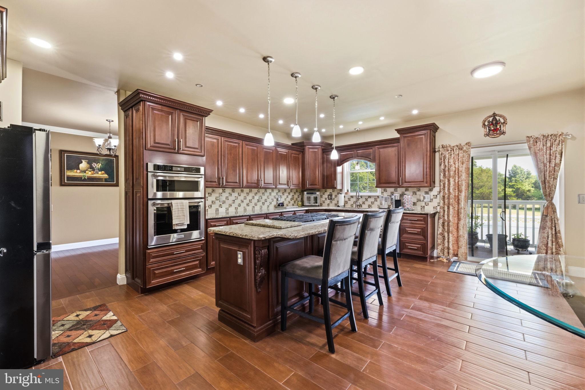 17 Paddock Road Marlton, NJ 08053 - Photo 10 of 54 Elegant kitchen with rich cabinetry.