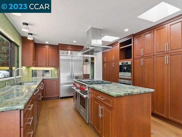 9 Redwood Circle Lafayette, CA 94549 - Photo 13 of 36 a kitchen with stainless steel appliances granite countertop a stove refrigerator sink and cabinets