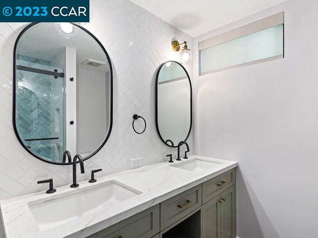 9 Redwood Circle Lafayette, CA 94549 - Photo 25 of 36 a bathroom with a sink and mirror