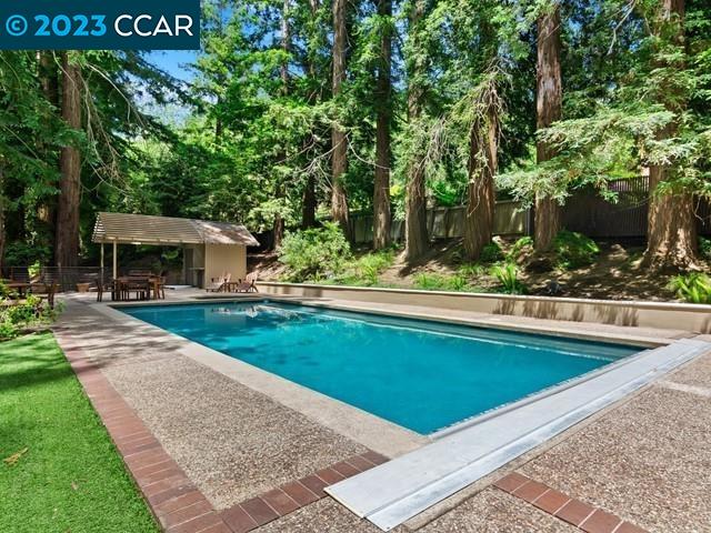 9 Redwood Circle Lafayette, CA 94549 - Photo 27 of 36 a view of house with swimming pool