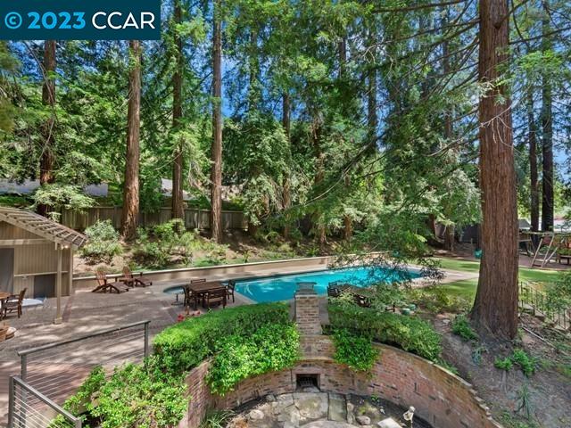 9 Redwood Circle Lafayette, CA 94549 - Photo 32 of 36 a yard with large trees