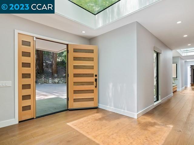 9 Redwood Circle Lafayette, CA 94549 - Photo 5 of 36 a view of a hallway with wooden floor and closet
