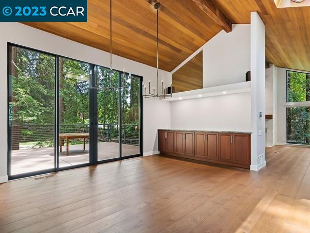 9 Redwood Circle Lafayette, CA 94549 - Photo 6 of 36 a view of a backyard with wooden floor and iron fence