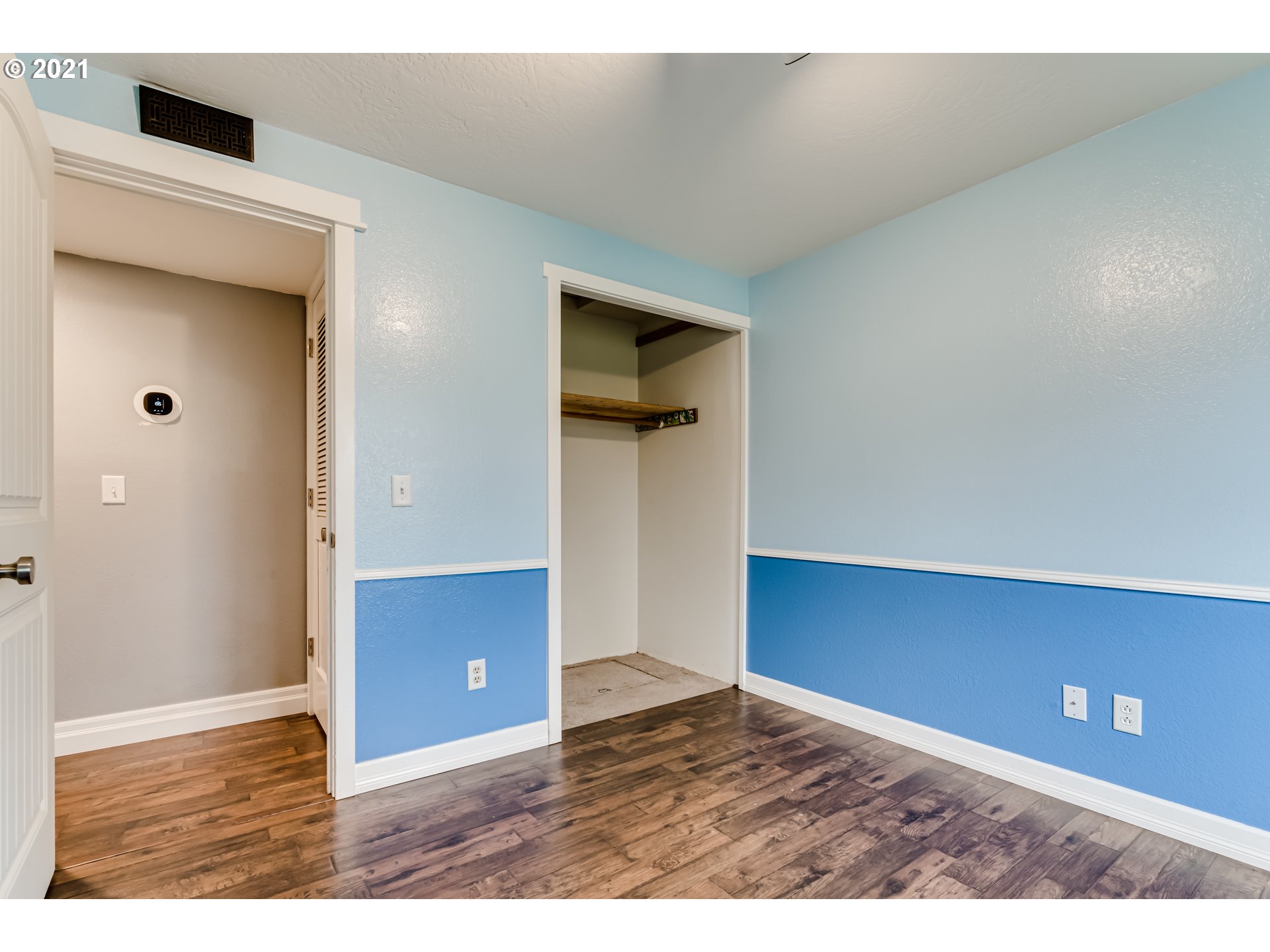 5609 C Street Springfield, OR 97478 - Photo 16 of 26 a view of an empty room and wooden floor
