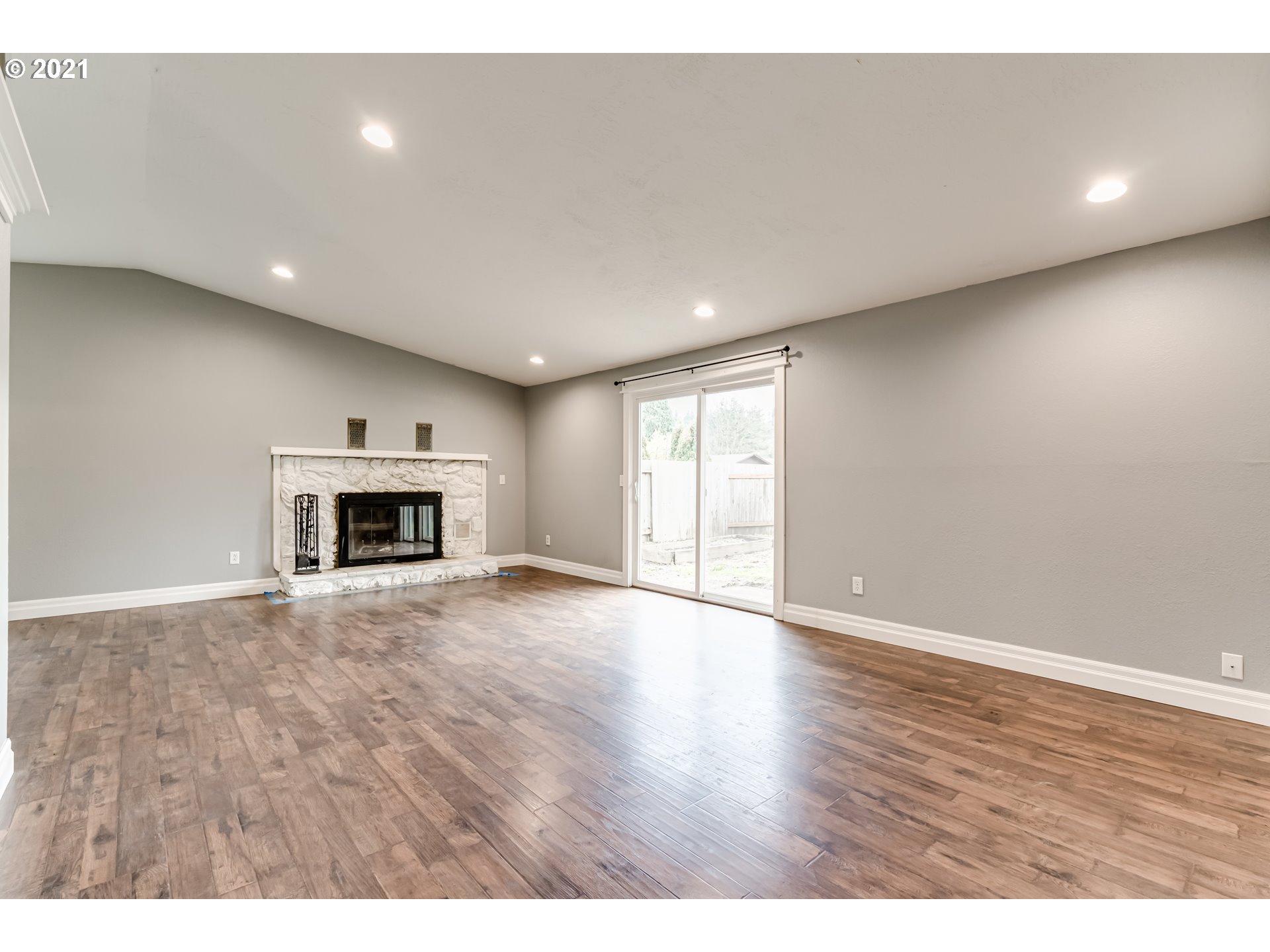 5609 C Street Springfield, OR 97478 - Photo 3 of 26 a view of empty room with a fireplace