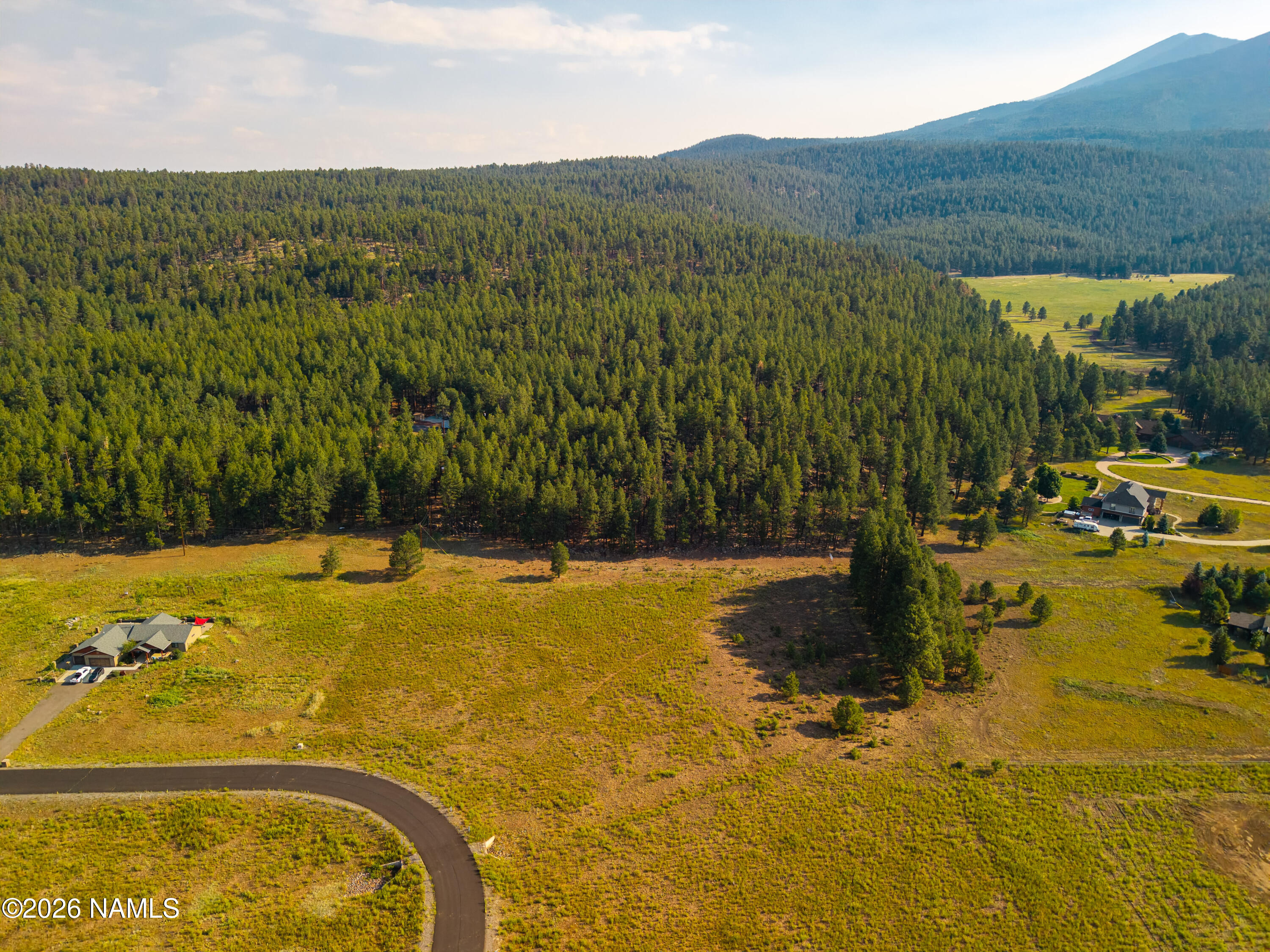 9217 Ranch At The Peaks Way Flagstaff, AZ 86001 - Photo 2 of 12 a view of swimming pool with mountain view