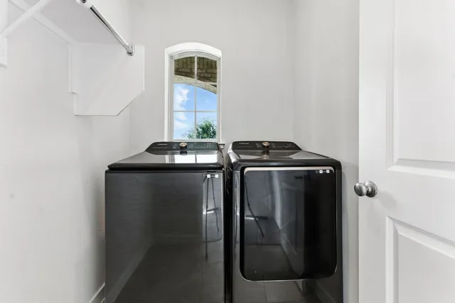 a bathroom with a toilet sink and shower