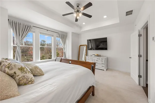 a spacious bathroom with a double vanity sink mirror and double