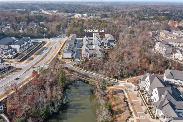 a view of a building next to a street