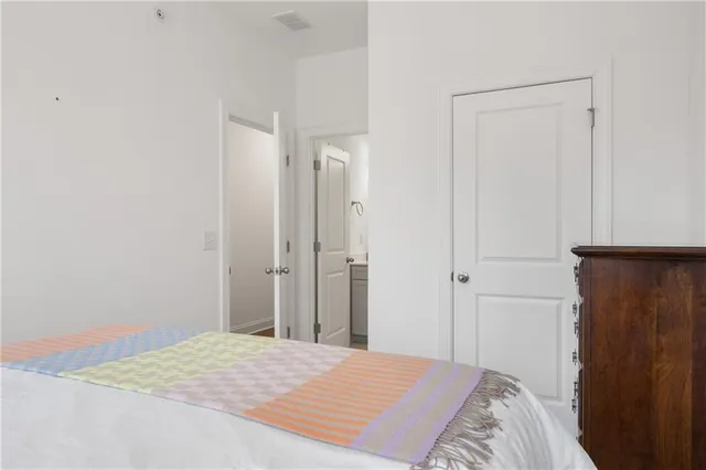 a front view of a brick house with a large windows