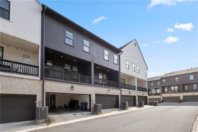 a lobby with furniture chandelier and a chandelier