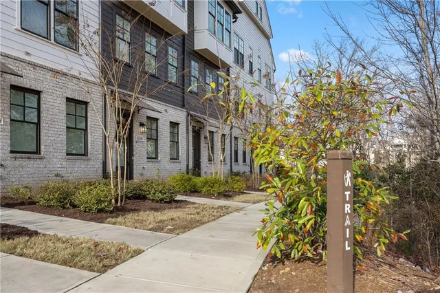 a view of a hallway with stairs