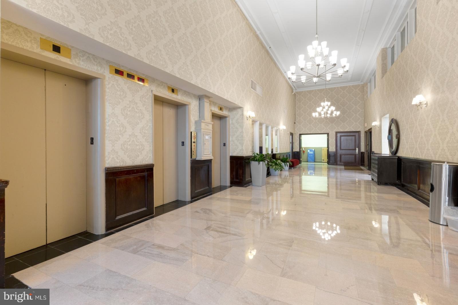 1324 Locust Street, Unit 1503 Philadelphia, PA 19107 - Photo 26 of 38 a view of a lobby with black carpet