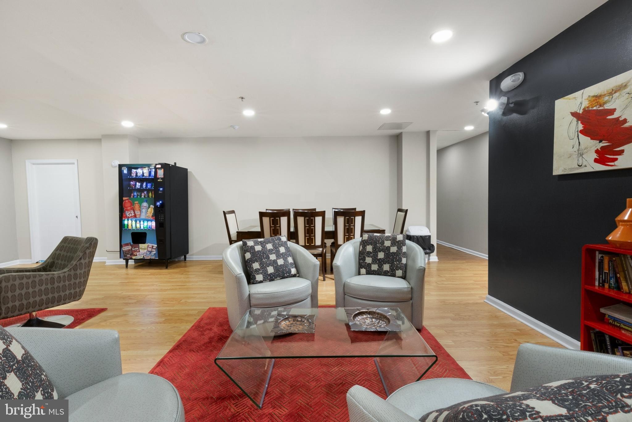 1324 Locust Street, Unit 1503 Philadelphia, PA 19107 - Photo 35 of 38 a living room with furniture and wooden floor