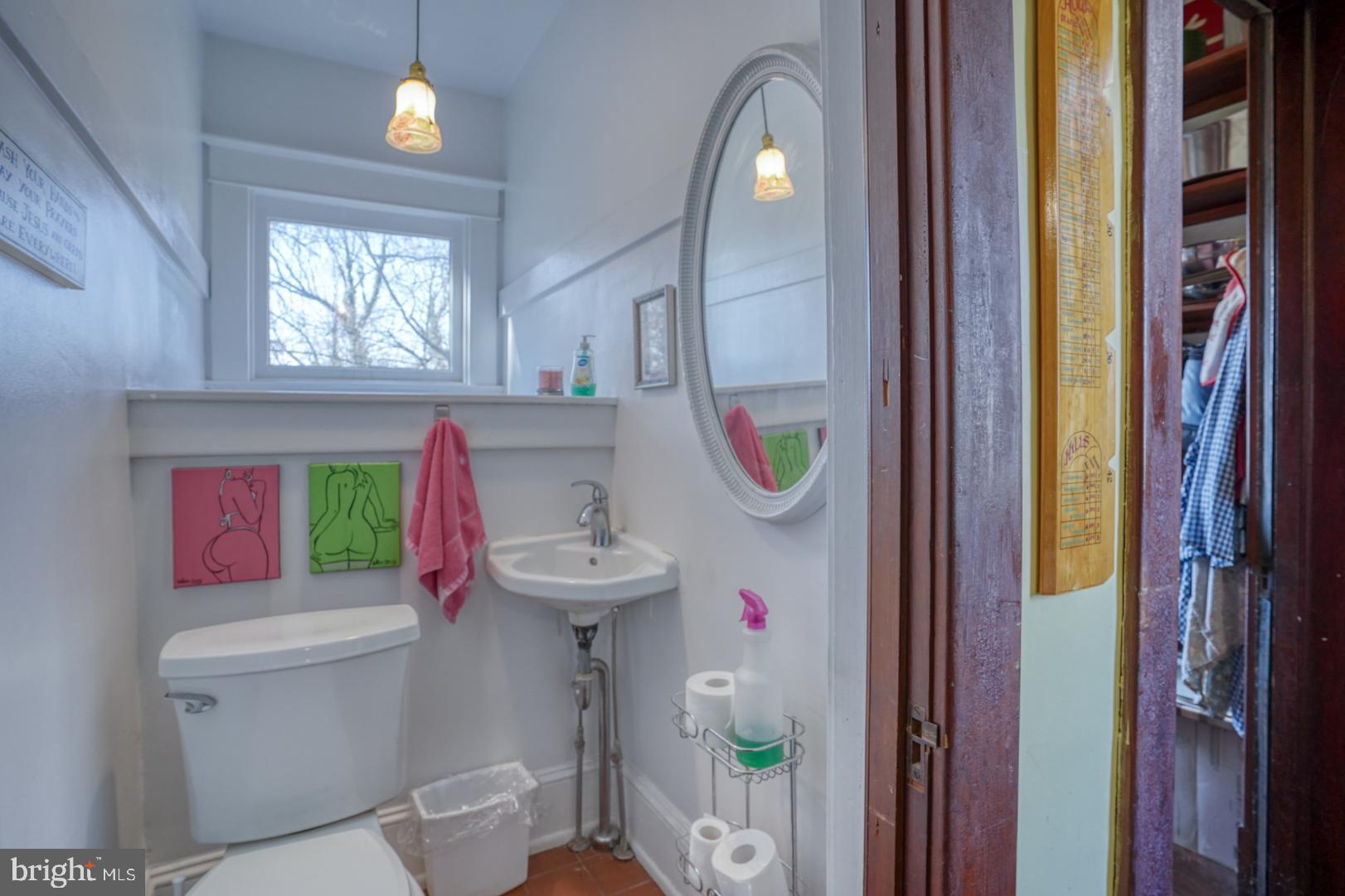 4096 Main Street Trappe, MD 21673 - Photo 38 of 70 a bathroom with a sink and a mirror