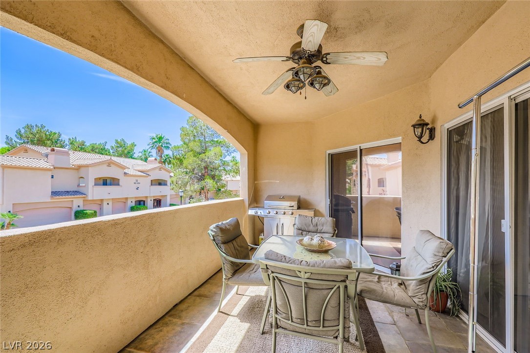 2050 West Warm Springs Road, Unit 3624 Henderson, NV 89014 - Photo 34 of 40 Balcony featuring ceiling fan and grilling area