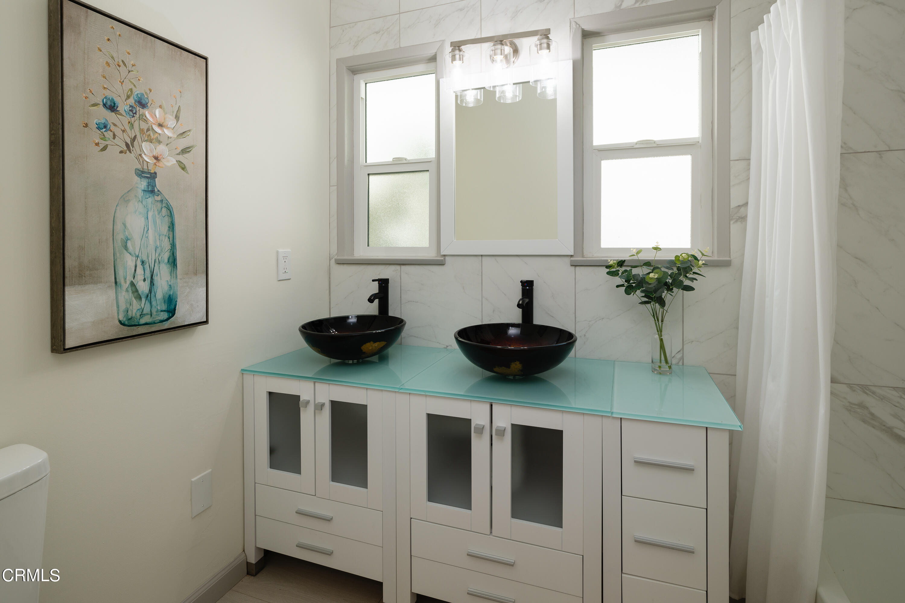 3720 Newhaven Road Pasadena, CA 91107 - Photo 18 of 37 a kitchen with stainless steel appliances a sink a window and cabinets