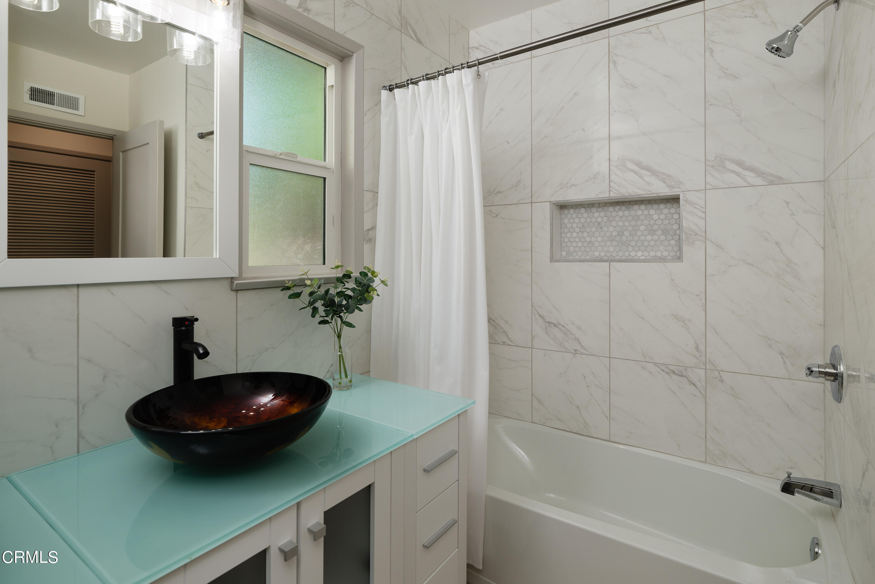 3720 Newhaven Road Pasadena, CA 91107 - Photo 25 of 37 a bathroom with a sink and a mirror