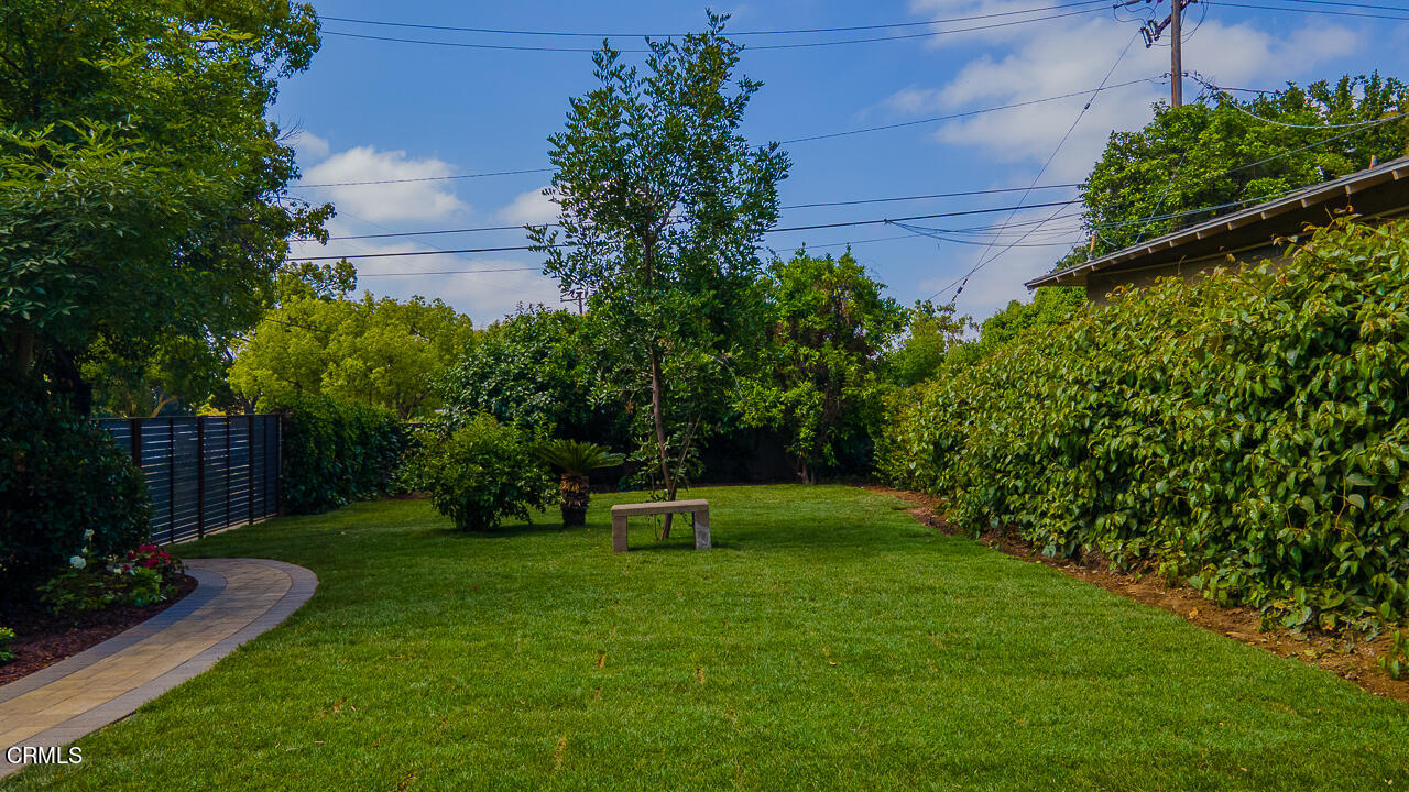3720 Newhaven Road Pasadena, CA 91107 - Photo 36 of 37 a garden with trees and wooden fence