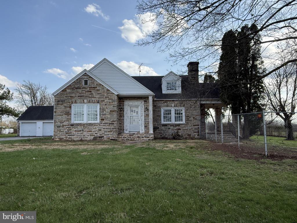 6245 Middleburg Road Keymar, MD 21757 - Photo 2 of 77 a front view of a house with a garden