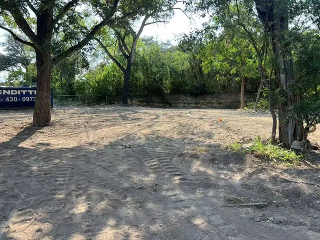 a view of backyard with green space