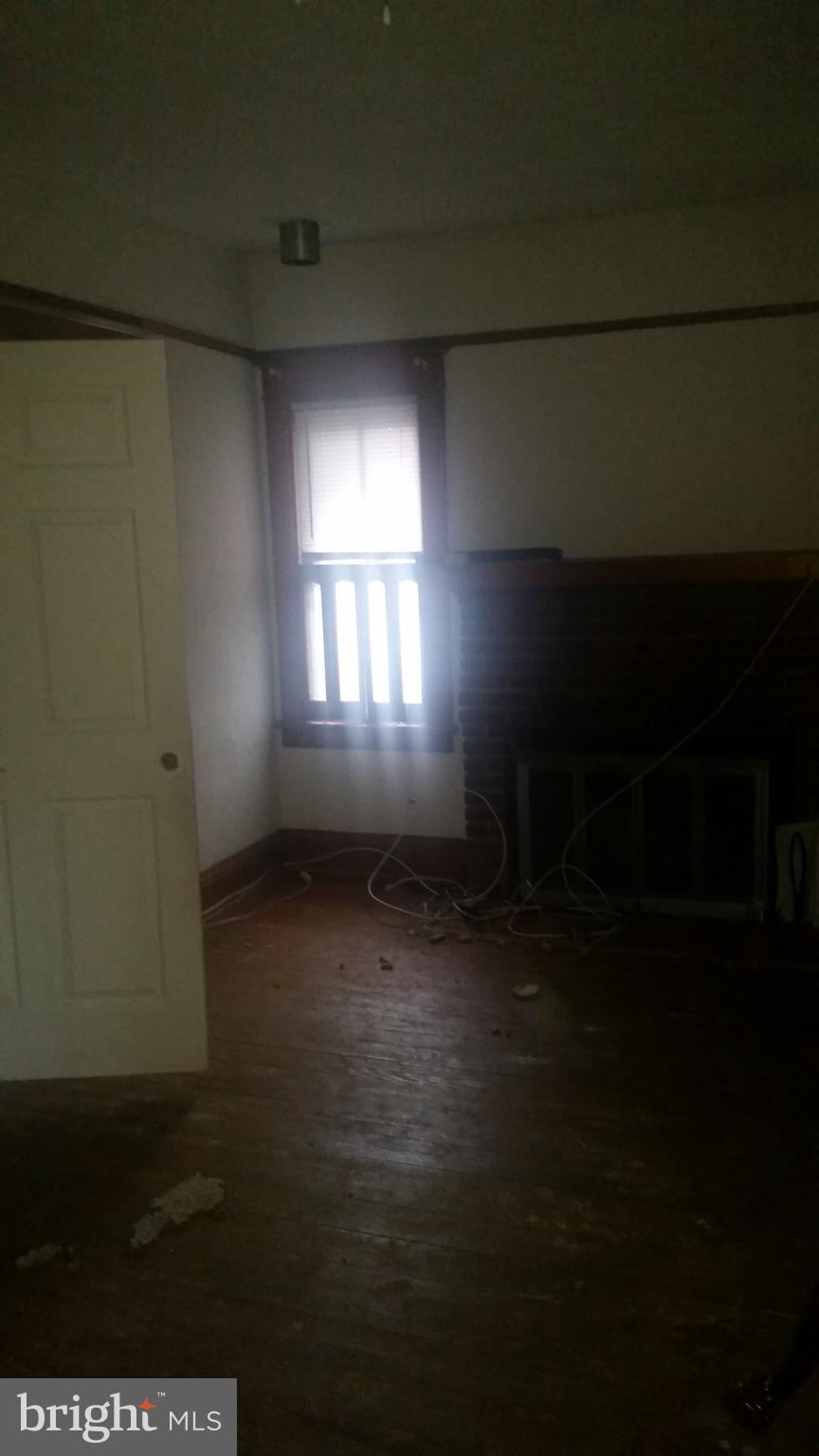 9218 Crandall Road Lanham, MD 20706 - Photo 11 of 12 a view of an empty room and window
