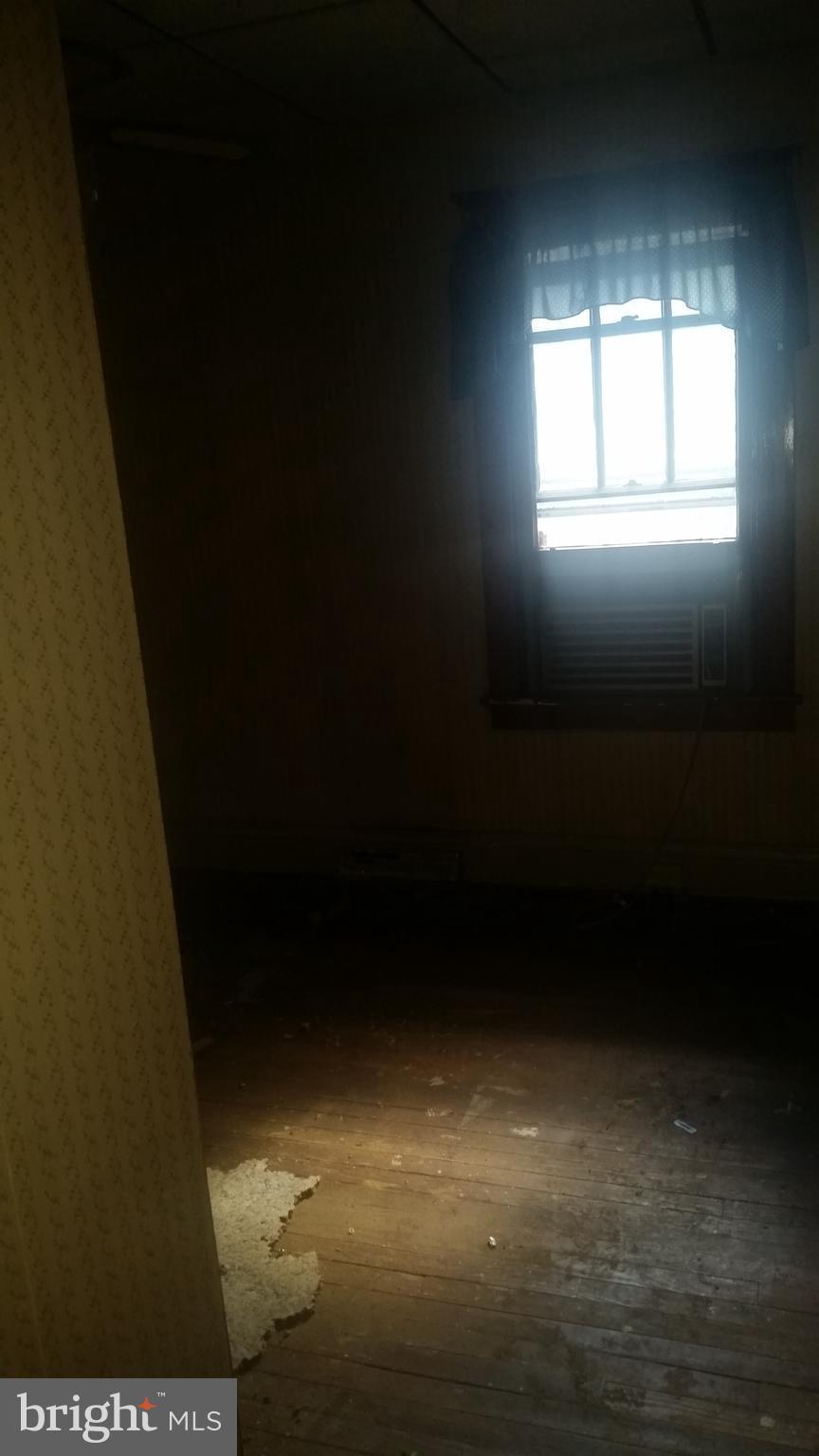 9218 Crandall Road Lanham, MD 20706 - Photo 10 of 12 a view of empty room with window