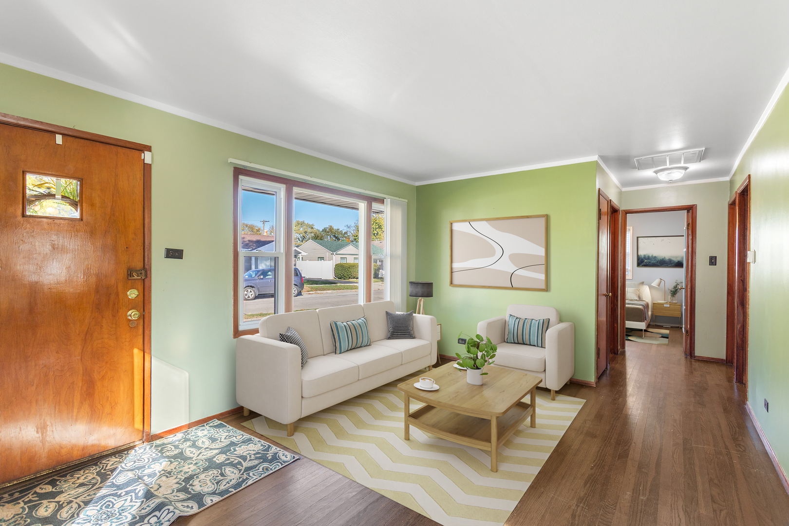 8635 44th Place Lyons, IL 60534 - Photo 2 of 15 a living room with furniture and a wooden floor
