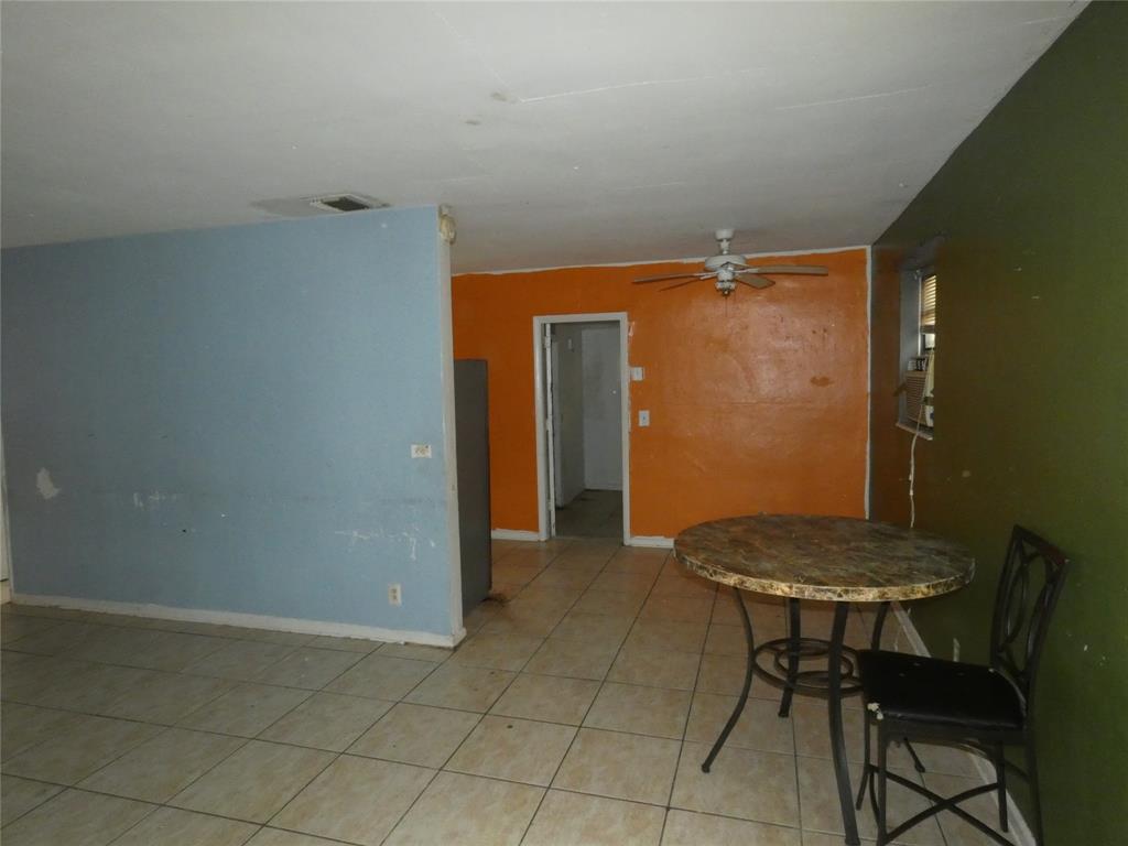 82 Tortuga Road Palm Springs, FL 33461 - Photo 15 of 17 a view of a room with table and chair