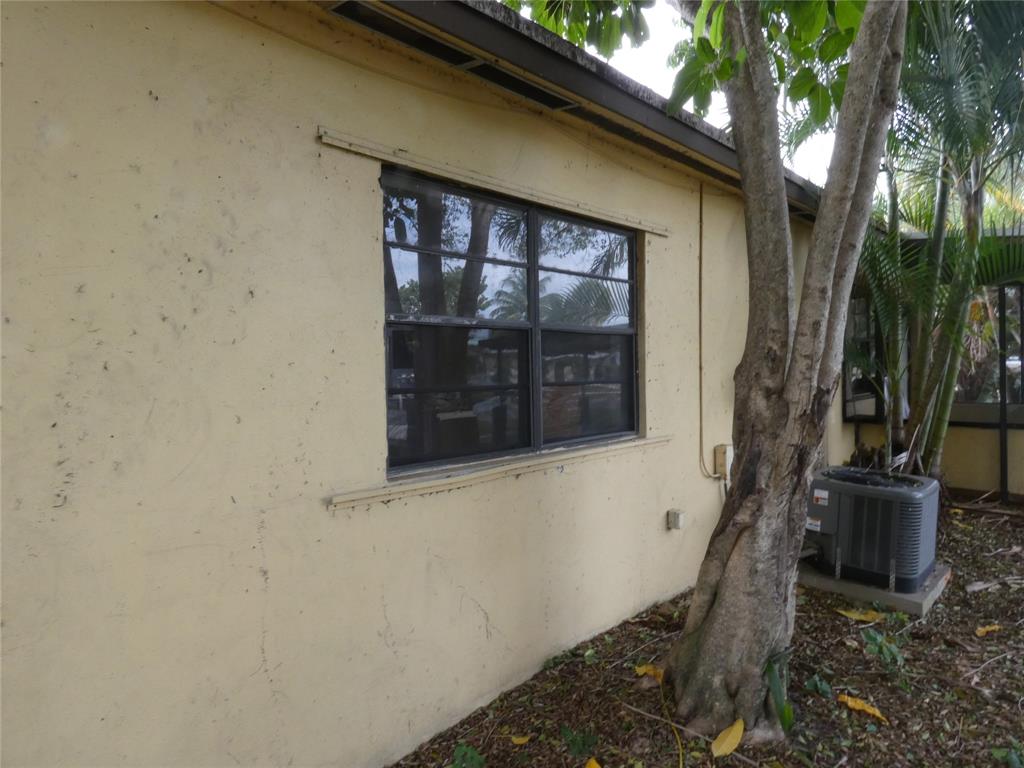 82 Tortuga Road Palm Springs, FL 33461 - Photo 6 of 17 a house with a window