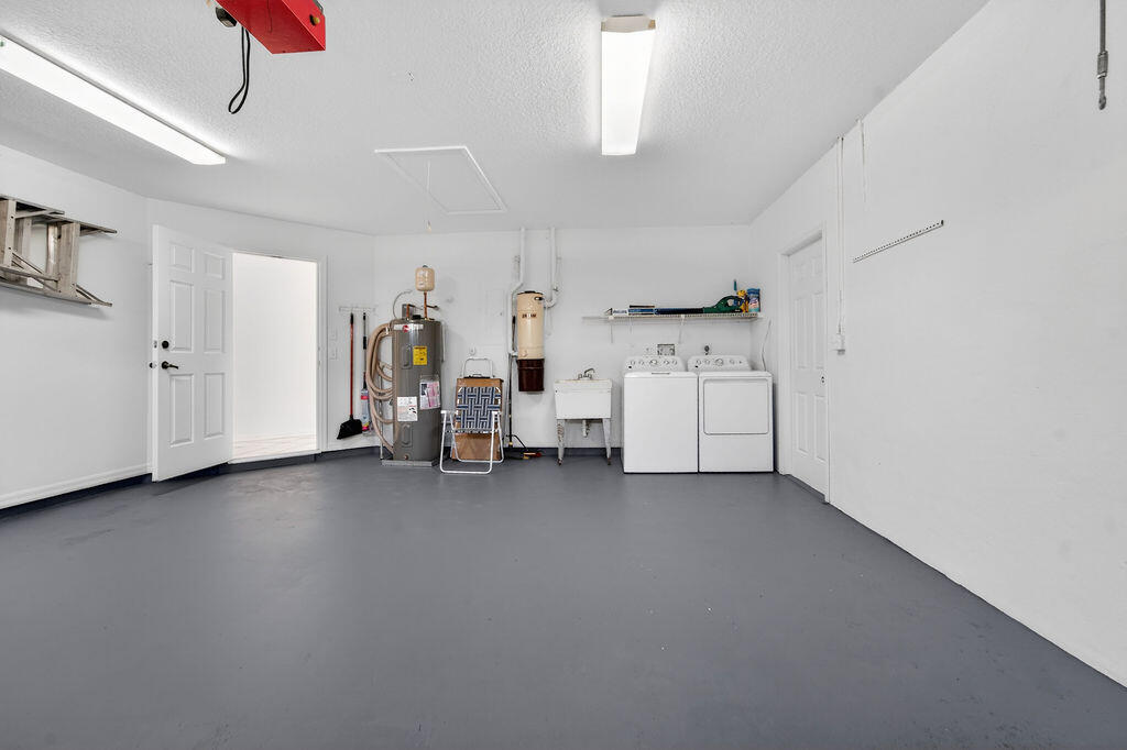 762 Southwest Ancona Road Port St. Lucie, FL 34953 - Photo 22 of 30 Garage Laundry