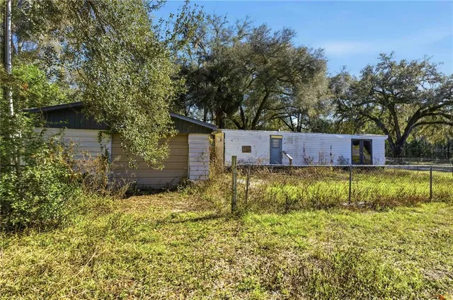 a house view with a garden space