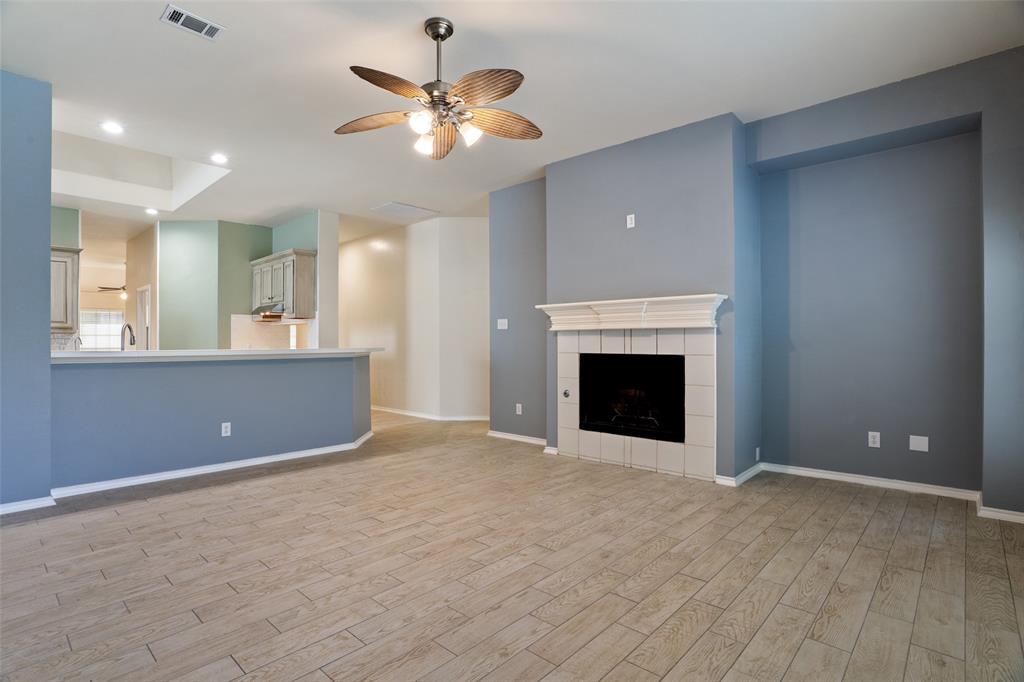 1204 Morrow Lane Allen, TX 75002 - Photo 15 of 19 an empty room with fan and entrance