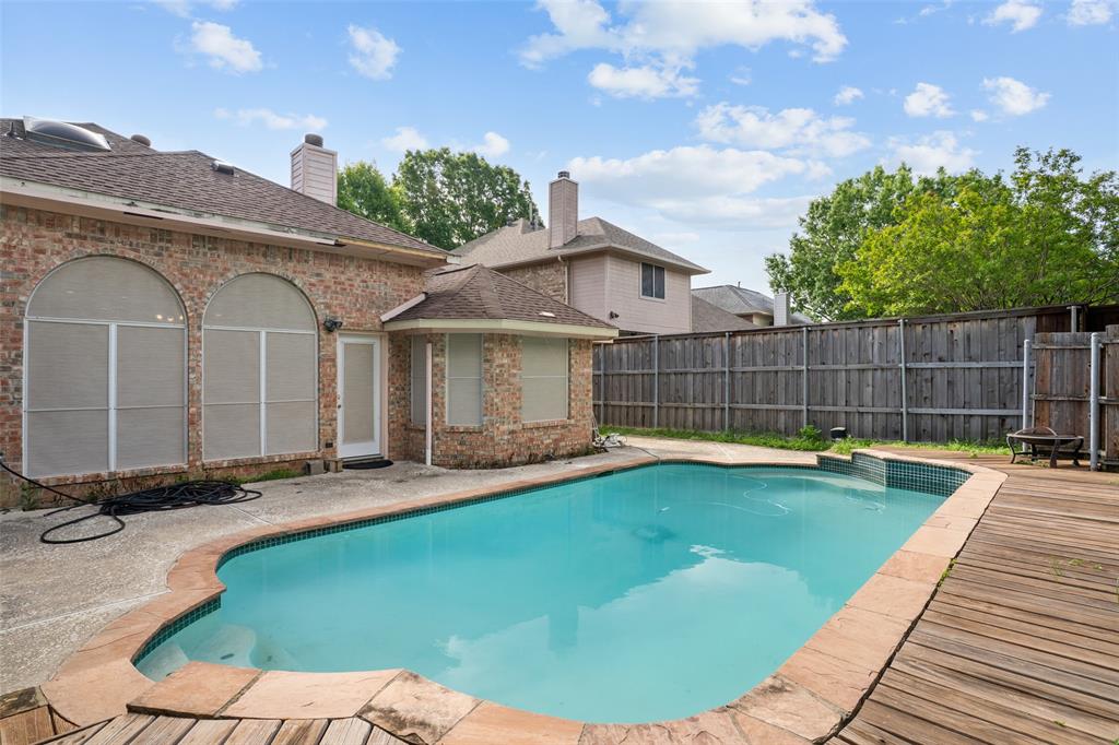 1204 Morrow Lane Allen, TX 75002 - Photo 19 of 19 a view of a house with swimming pool and sitting area