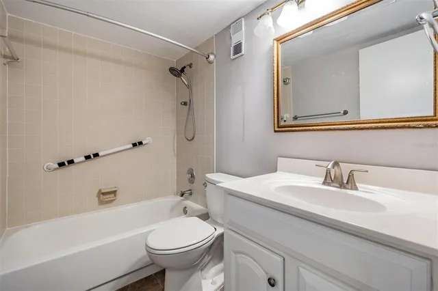 a bathroom with a sink a toilet and a bathtub