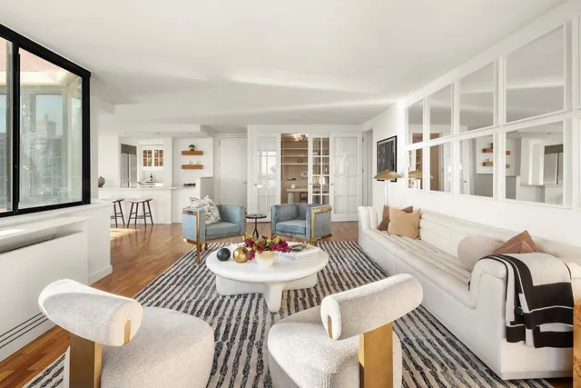 a view of a living room and dining room