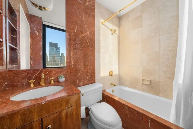 a bathroom with sink and mirror