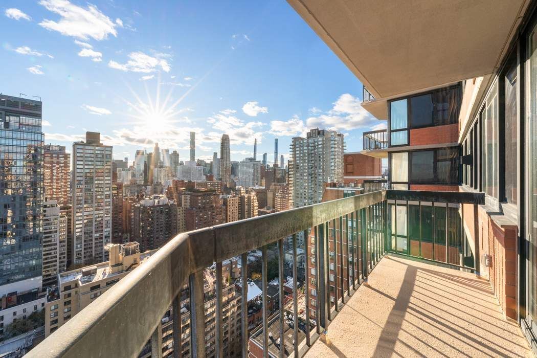 330 East 75th Street, Unit 28BC Manhattan, NY 10021 - Photo 19 of 20 a view of balcony with city view