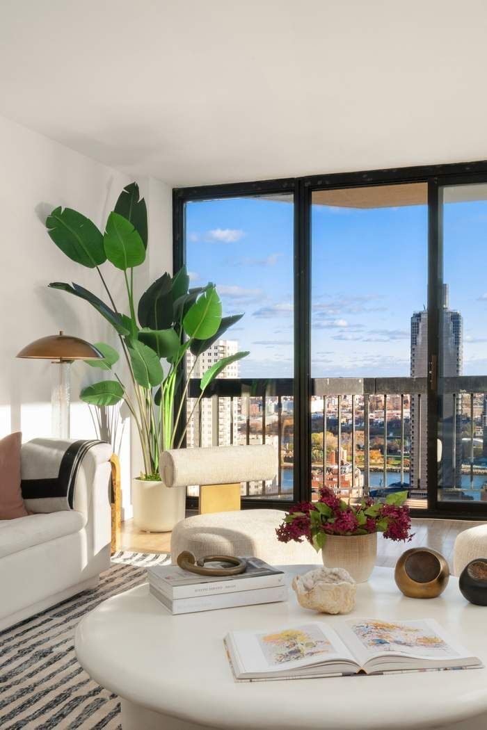 330 East 75th Street, Unit 28BC Manhattan, NY 10021 - Photo 3 of 20 a view of a flower pot on a table