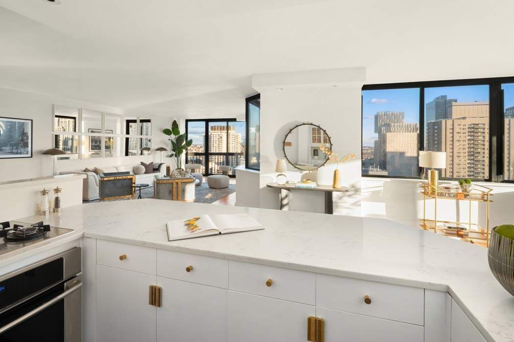 330 East 75th Street, Unit 28BC Manhattan, NY 10021 - Photo 8 of 20 a very nice looking room with a large window