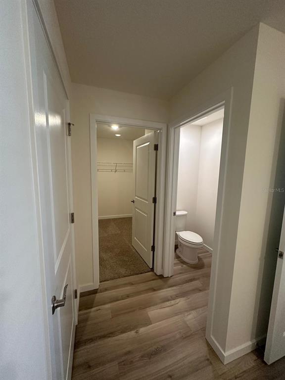 4697 Southwest 89th Street Ocala, FL 34476 - Photo 8 of 11 a bathroom with a shower and a toilet