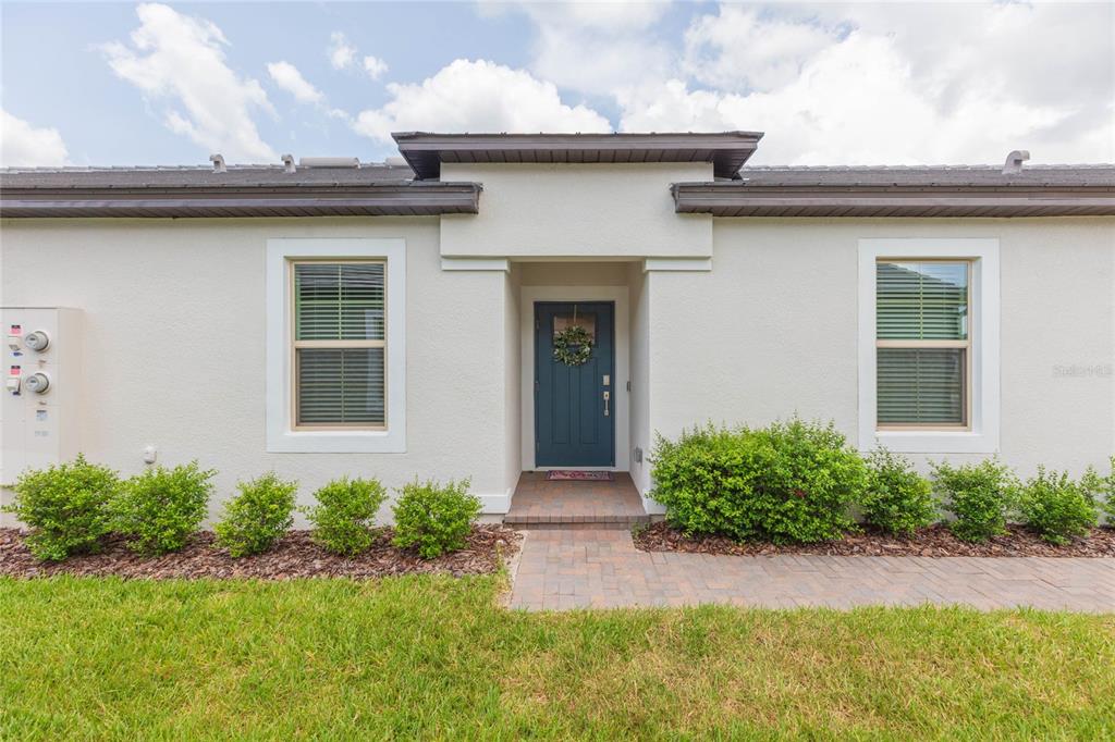 10806 Gable Dig Loop San Antonio, FL 33576 - Photo 4 of 73 a front view of a house with garden