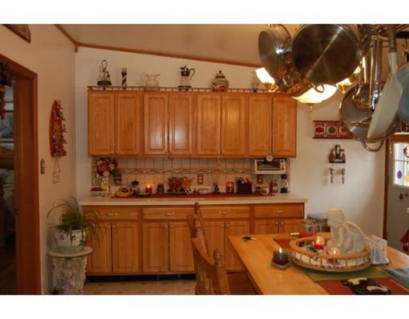 102 Clapp Road Hardwick, MA 01037 - Photo 2 of 11 a kitchen with a sink and cabinets
