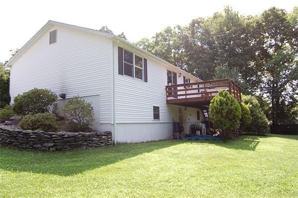 102 Clapp Road Hardwick, MA 01037 - Photo 9 of 11 a view of a backyard with plants and a patio
