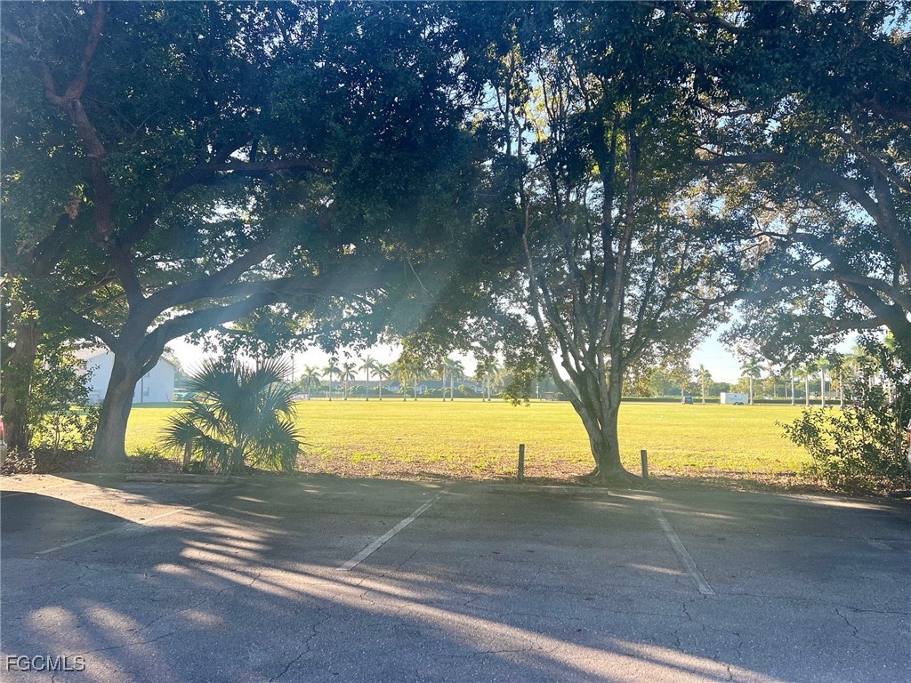 1560 Colonial Boulevard, Unit 134 Fort Myers, FL 33907 - Photo 4 of 12 a view of an outdoor space with a lake view
