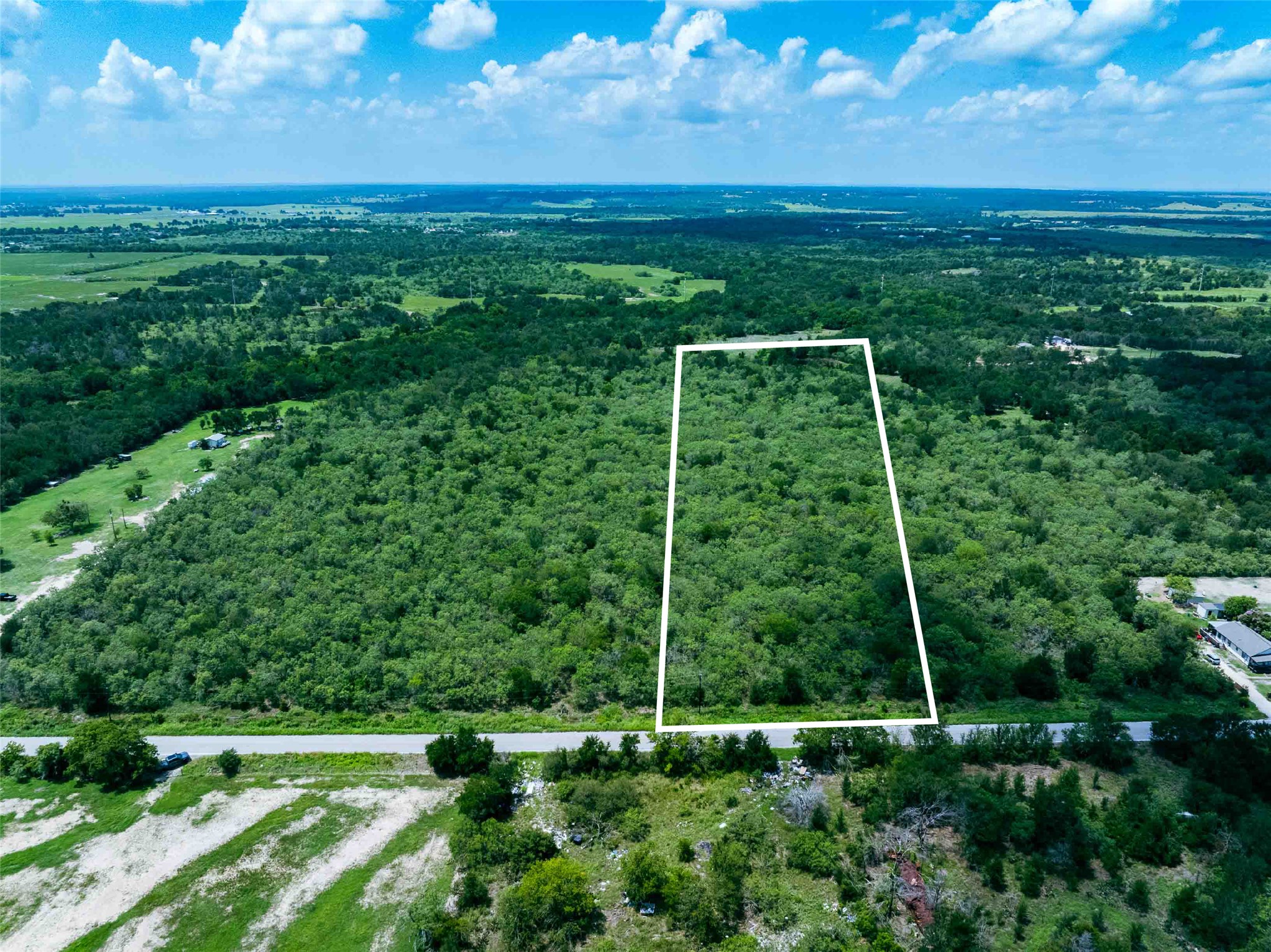 17715 Albert Voelker Road Elgin, TX 78621 - Photo 1 of 19 a view of a garden with an outdoor space