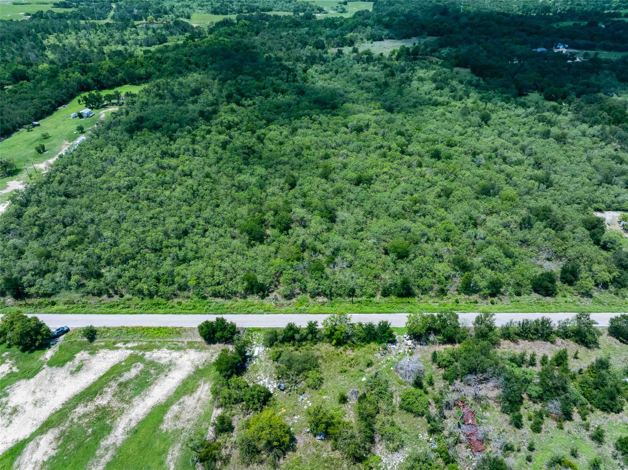 17715 Albert Voelker Road Elgin, TX 78621 - Photo 2 of 19 a view of an outdoor space with a lake view