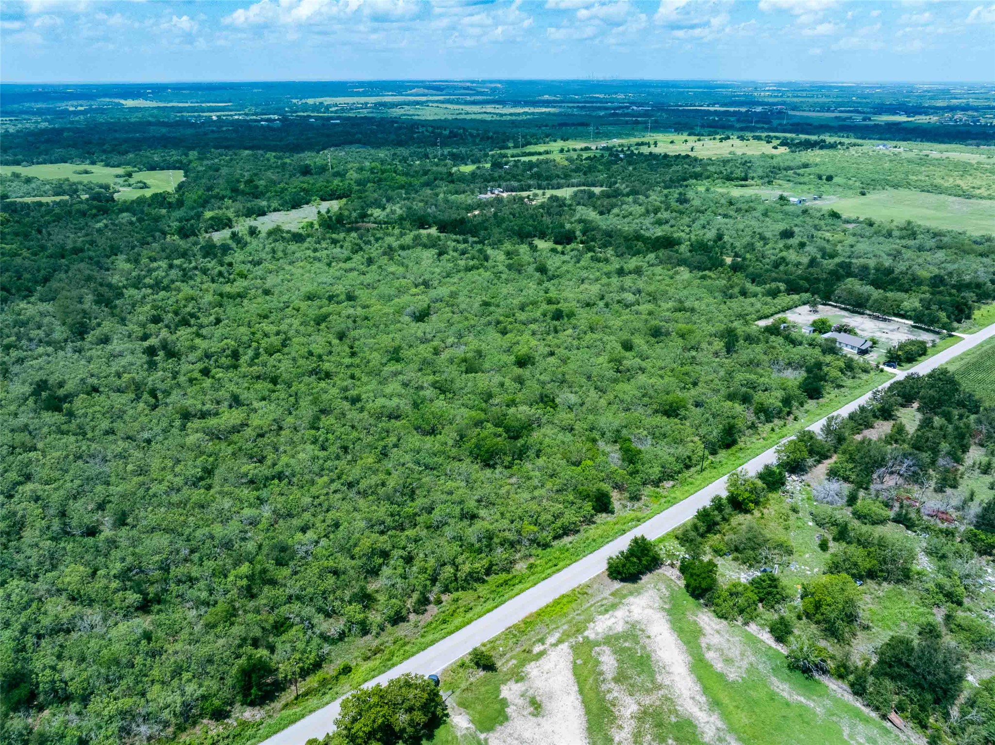 17715 Albert Voelker Road Elgin, TX 78621 - Photo 10 of 19 a view of an outdoor space with a lake view
