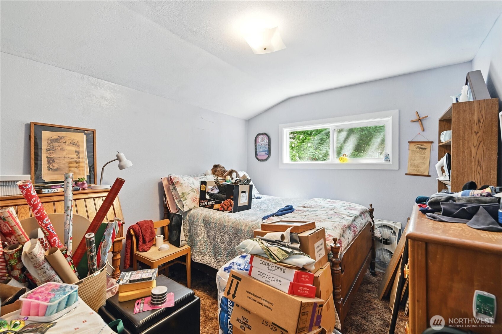 970 East Bakerview Road Bellingham, WA 98226 - Photo 12 of 16 a bedroom with furniture a bed and a flat screen tv