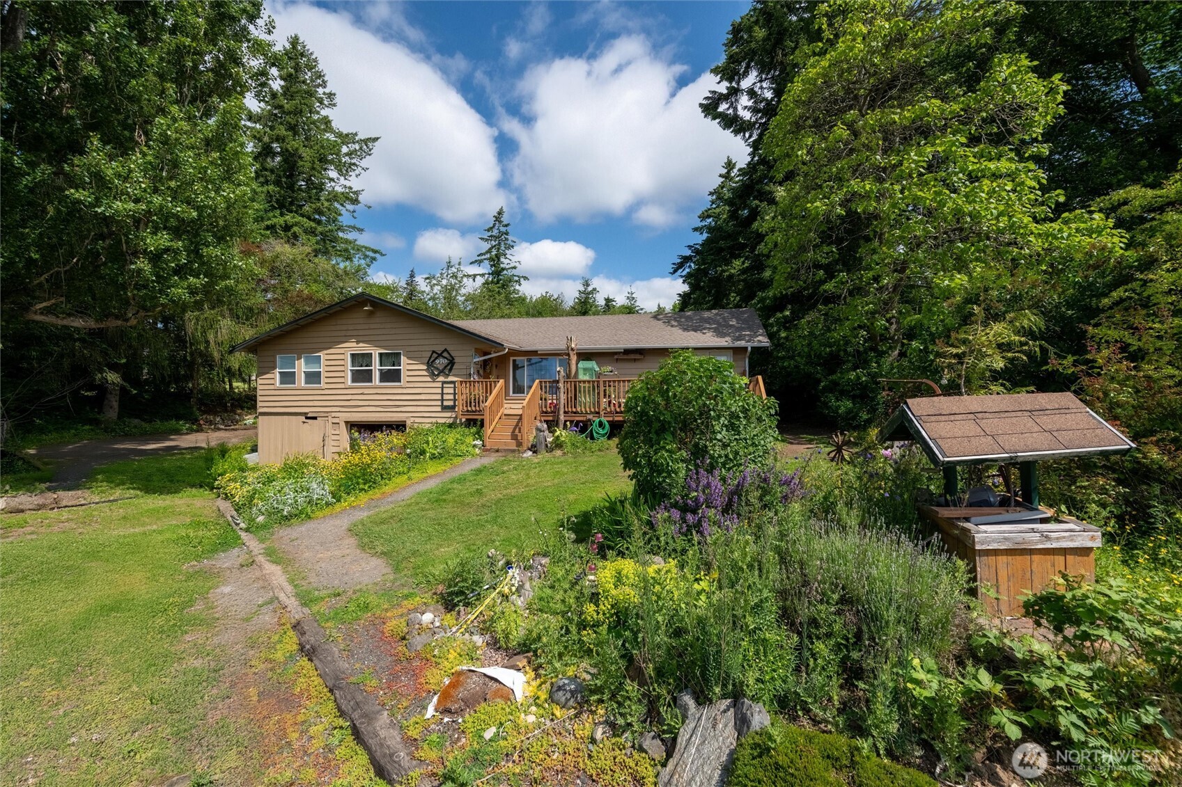 970 East Bakerview Road Bellingham, WA 98226 - Photo 15 of 16 a front view of a house with garden